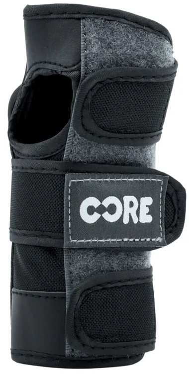 The CORE Junior Triple Skate Protection Pad Set in Black/Grey features padded wrist guards with Velcro straps and a white "CORE" logo patch, providing essential wrist protection for skatepark safety and physical activities.