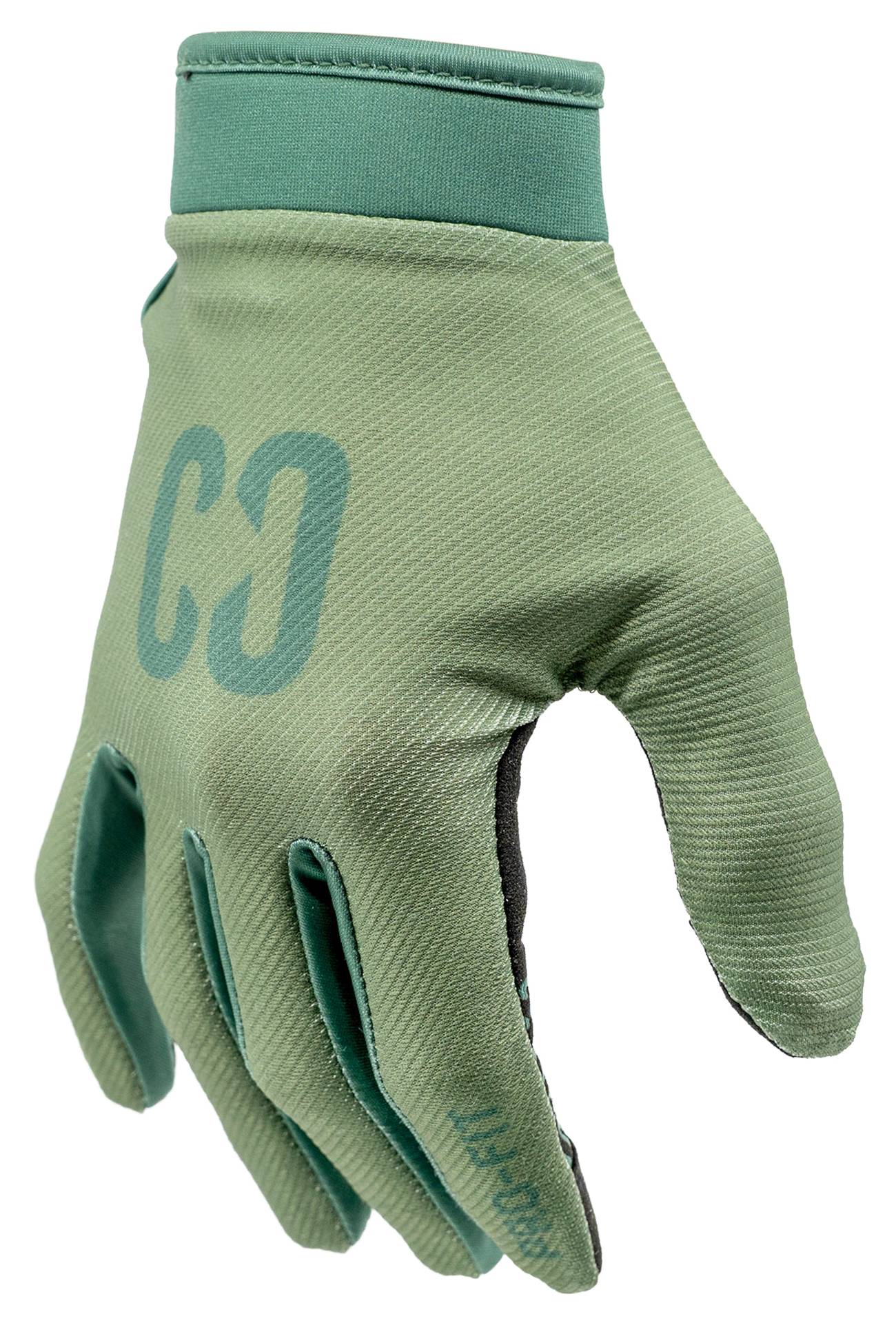 A pair of CORE Pro-Fit Velcro Skate Protection Gloves in Army Green is displayed upright, prominently showing the back of the hand and fingers with the “CORE” branding visible.