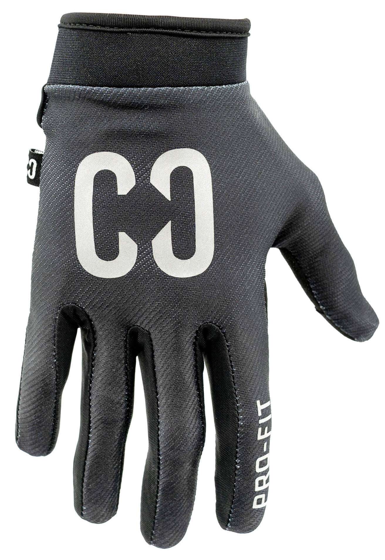 A pair of CORE Pro-Fit Velcro Skate Protection Gloves - Reflective Black by CORE, featuring white “C3” text on the back and “PRO-FIT” on one finger, designed for a snug fit and ideal for BMX riding, displayed against a white background.