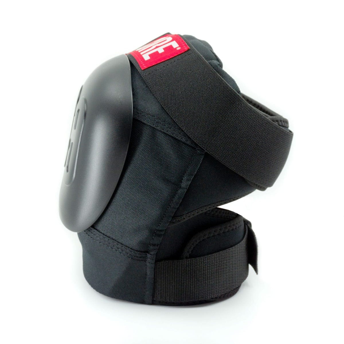 The CORE Pro Park Knee Skate Protection Pads in black are ideal for skatepark riders, featuring a Dynamic Size System and adjustable straps. With a hard outer shell designed for impact resistance, these knee pads are highlighted by a red label on top and displayed vertically against a white backdrop.