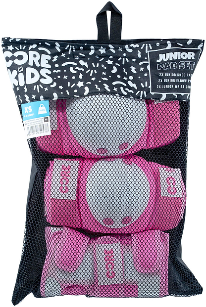 A black mesh bag containing the CORE Junior Triple Skate Protection Pad Set in pink, featuring knee pads, elbow pads, and wrist guards for kids. This protective gear set by CORE in size XS is ideal for young riders at the skatepark.