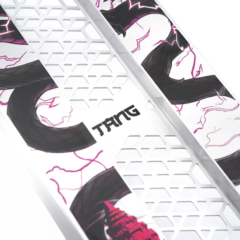 Close-up of the CORE SL3 Forged Brandon Tang Signature Stunt Scooter Deck (5.25″ x 19.3″) by CORE, showcasing its metallic finish, hexagonal cutouts, and striking black and magenta artwork centered around the word “TANG.” This modern, dynamic design highlights Brandon Tang’s signature edition within the CORE SL3 series.