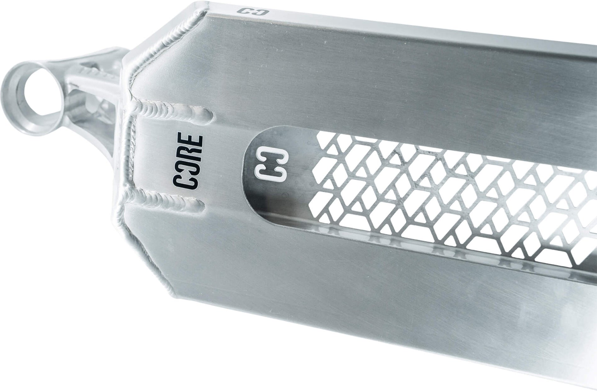 Close-up of the CORE SL3 Forged Polished Stunt Scooter Deck (6″ x 21″)—a metallic deck featuring a honeycomb-patterned cutout, visible welds, and a looped end. The words “CORE” and “C3” appear in black text, highlighting hallmark design elements from the CORE brand’s SL3 series.