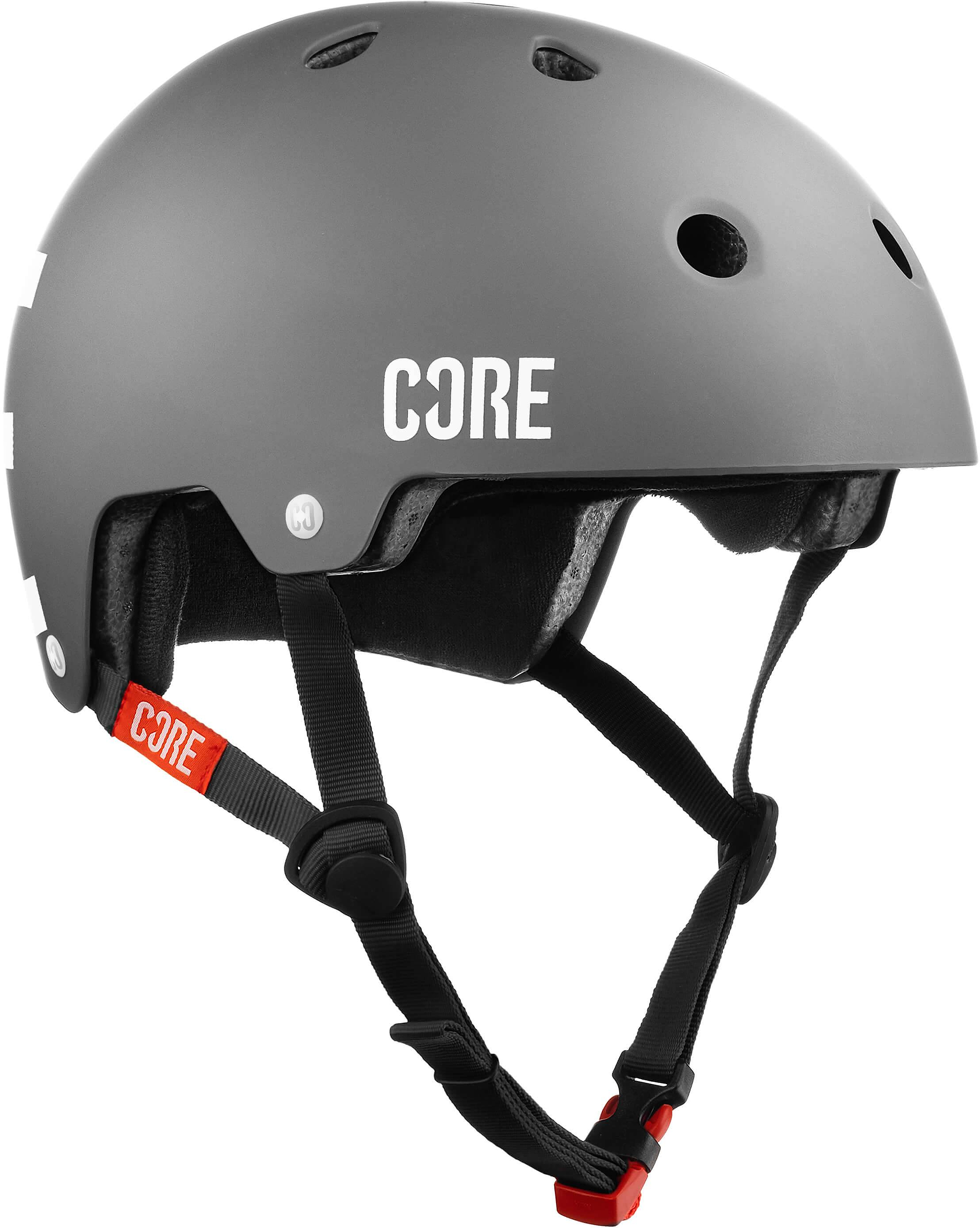 Introducing the CORE Street Skate / Scooter Helmet - Grey by CORE, featuring ventilation holes, black adjustable straps, a red buckle, and soft interior padding. This helmet is designed for optimal fit and superior head protection during sports or outdoor activities.
