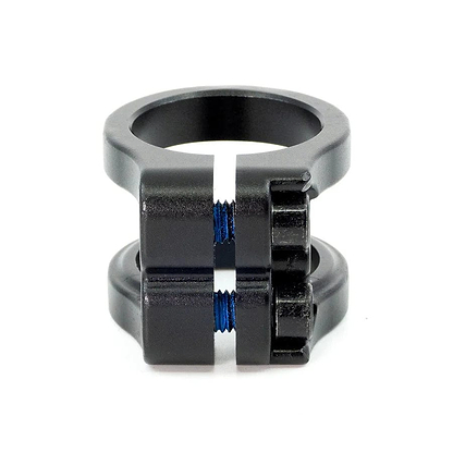 This CORE Venom 2 Bolt Oversized Stunt Scooter Clamp by CORE, with its sleek black metal design, features two parts joined by screws and a circular opening at the top, making it ideal for delivering stability and style to your scooter.