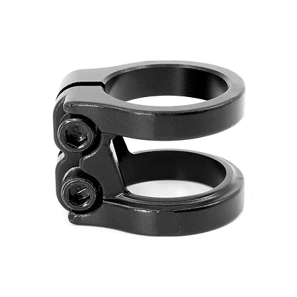 The CORE Venom 2 Bolt Oversized Stunt Scooter Clamp by CORE is a versatile, double clamp featuring two screws, ideal for securely attaching components such as handlebars or seat posts on bicycles. It boasts a sleek matte black finish and a compact design that guarantees both reliability and style.