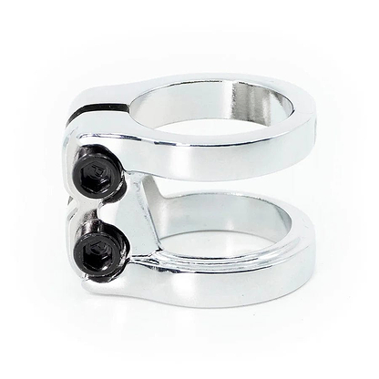 The CORE Venom 2 Bolt Oversized Stunt Scooter Clamp in Chrome, made by CORE, features a CNC machined aluminum double clamp with two black hex screws, merging lightweight design and robust functionality.