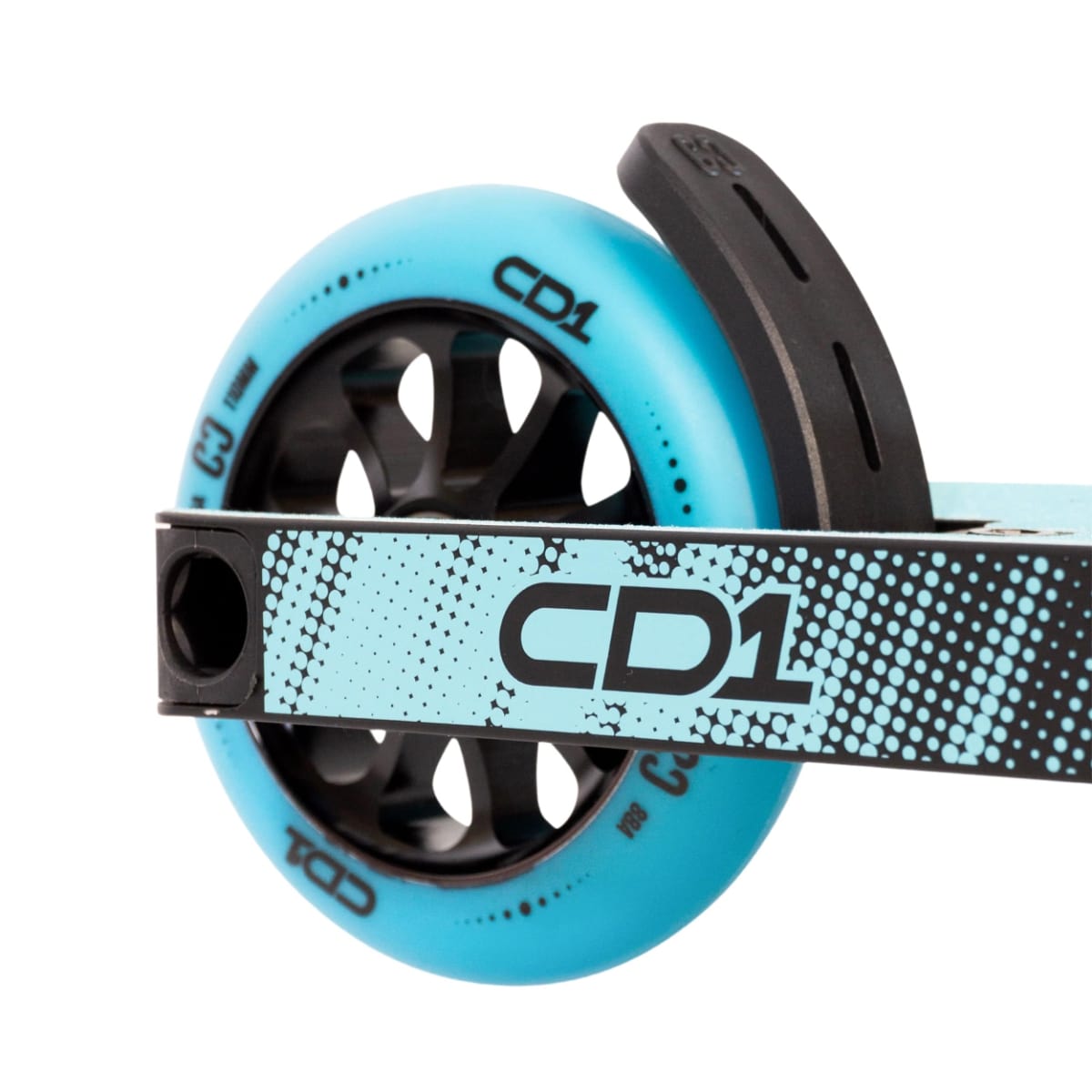 Close-up of a premium wheel from the CORE CD1 Complete Stunt Scooter, showcasing its sleek black and blue design, ideal for beginner riders. The wheel prominently features "CD1" in bold letters. Additionally, the scooter's frame is adorned with a blue dotted pattern and CORE branding, making it perfect for those new to stunt scooting.