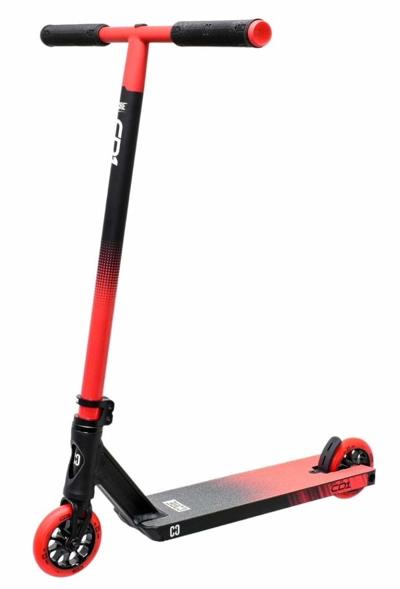 Introducing the CORE CD1 Complete Stunt Scooter in Red and Black, ideal for beginner riders. It features a T-bar handle and a sturdy aluminum deck that's perfect for tricks. The wheels sport striking red rims, while part of the deck stylishly transitions from black to red. The brand name "CORE" is prominently displayed on both the upright and the deck.