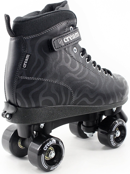The CREAM Scoop Wave Adjustable Quad Roller Skates in Black feature a swirling pattern and are crafted from vegan leather, with "CREAM" branding on the strap and wheels. Displayed against a white background, these adjustable quad roller skates by CREAM are ideal for beginner skaters seeking both style and comfort.