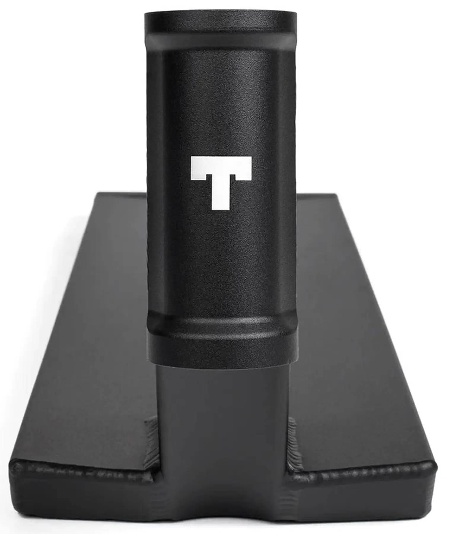 A close-up of the Tilt Stage I Pro Black Stunt Scooter Deck (6" x 21.5") shows its flat rectangular base, crafted from anodized 6000 series aluminium, and features a white Tilt "T" logo.