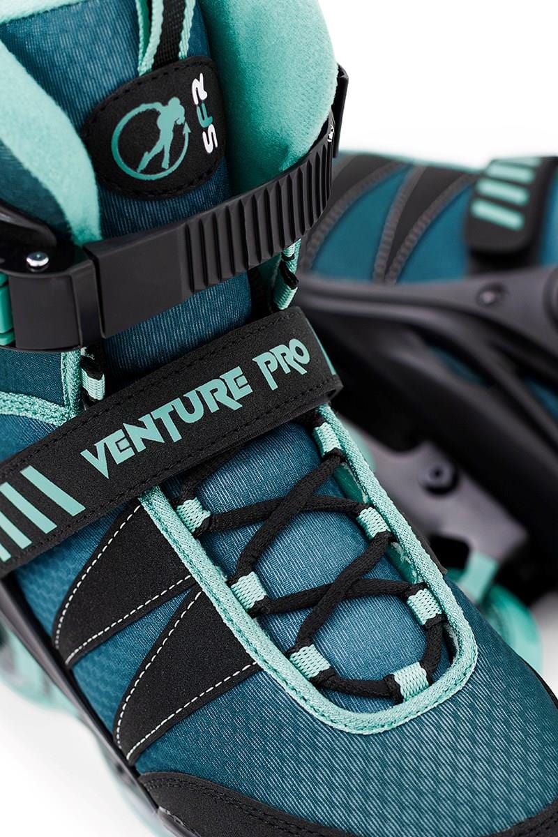 A close-up of the SFR Venture Pro Inline Skates - Teal reveals its teal and black design with "VENTURE PRO" on the strap. It features ABEC-7 bearings, a striped pattern, smooth laces, comfortable padded lining, and durable urethane wheels.