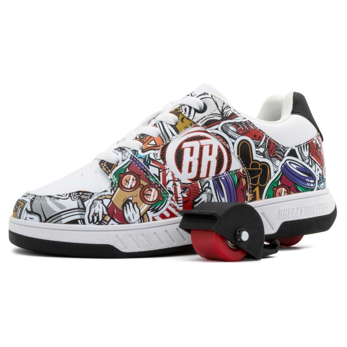 The Breezy Rollers Groovy Shoes - Cartoon by Breezy Rollers are white sneakers with colorful cartoon-style graphics, black trim, and a retractable red heel wheel featuring a patented system for smooth walking and rolling.