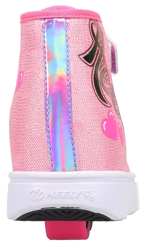 A close-up of the Heelys Veloz X2 Prints Girls Shoes in Prism Pink/Neon Pink/Multi shows a synthetic upper, iridescent stripe, heart accents, low-profile wheels on the sole, and an embossed Heelys logo on the white rubber heel.