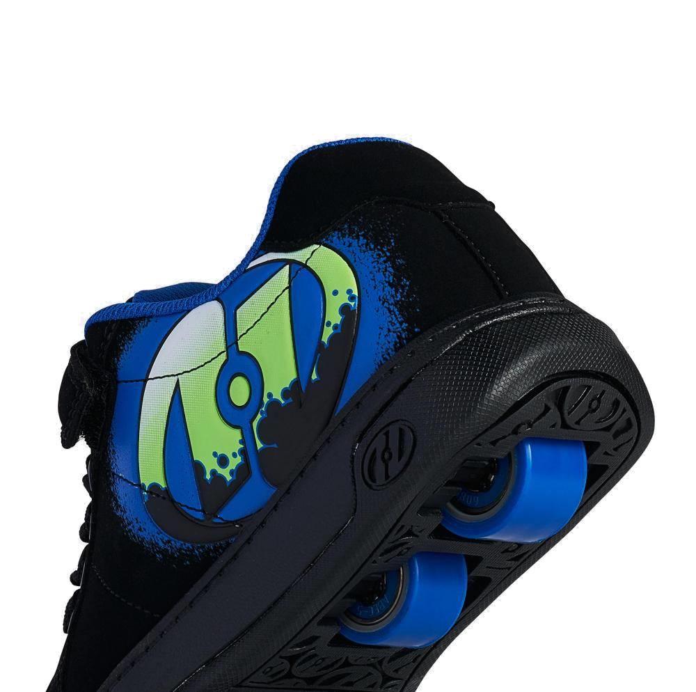 The Heelys Kolect X2 Boys Shoes in Black/Royal/Green feature a bold graffiti design, signature two-wheel style, and blue roller skate wheels—offering boys standout style and functional fun.