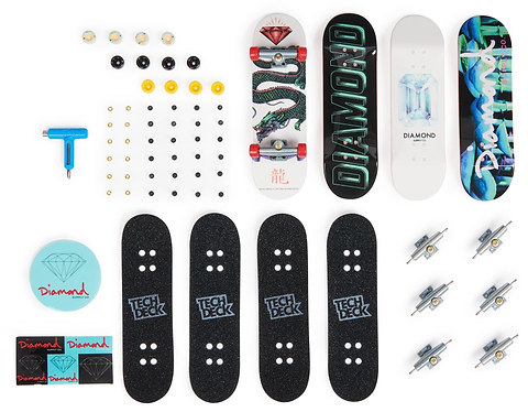 The Tech Deck M01 Deluxe 4 Pack Fingerboards - Diamond includes four authentic fingerboards with skateboard graphics, grip tapes, trucks, wheels, tools, stickers, and a blue carrying case by Tech Deck—displayed on a white background.