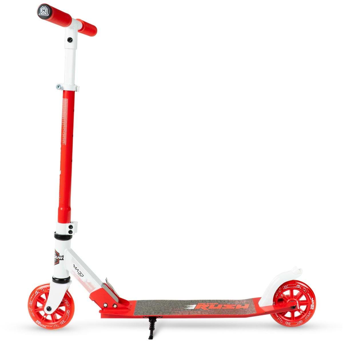 The Madd Gear Metro Rush 125 Kids Foldable Scooter in white/red features a black grip deck, 125mm LED wheels, adjustable handlebar, and kickstand, shown from the side on a white background.