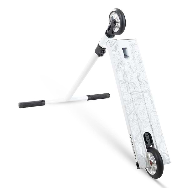 The Madd Gear (MGP) MG 4 Titan Complete Stunt Scooter in Arctic White features a textured deck, black handgrips, and black wheels—shown dynamically for action sports on a crisp white background.
