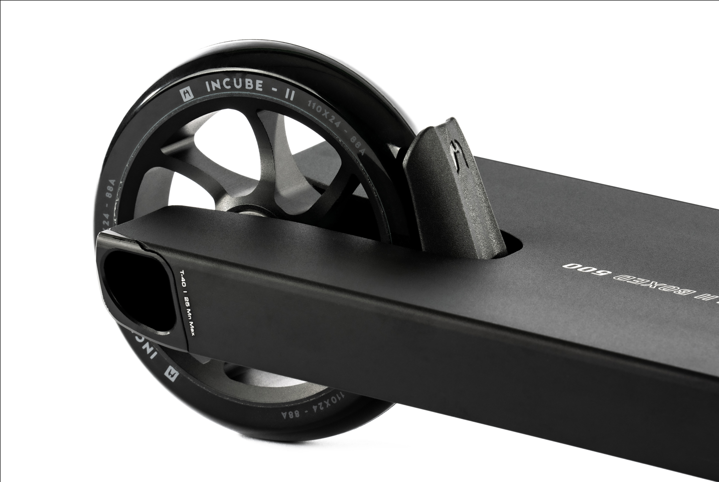 Close-up of the Ethic DTC Stunt Scooter 8 STD Fender V2 in black, highlighting the detailed rear wheel rim and integrated fender by Ethic DTC for enhanced stunt performance.