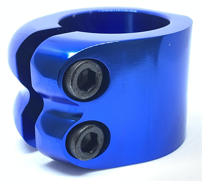 The Dare Warlord 2 Bolt Standard Stunt Scooter Clamp - Blue, from renowned brand Dare, is expertly crafted from durable 6061 T6 Aluminium and features a pair of hex bolts for securely fastening cylindrical objects. Its sleek and shiny blue finish is elegantly displayed against a plain white background, making it the perfect choice for a stunt scooter clamp upgrade.