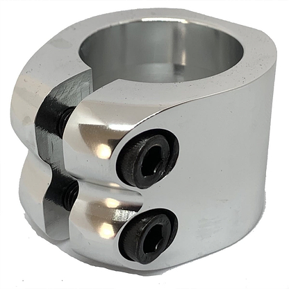 The Dare Warlord 2 Bolt Standard Stunt Scooter Clamp in Chrome is a CNC machined silver metal clamp with a polished finish and cylindrical shape, featuring two black screws visible on the side. It is designed to securely fasten stunt scooter components or other cylindrical objects.
