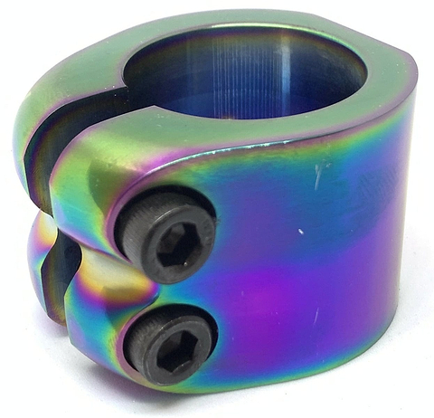 Introducing the Dare Warlord 2 Bolt Standard Stunt Scooter Clamp in Neochrome—a lightweight, CNC machined clamp showcasing a striking rainbow metallic finish, complete with two sleek black hex screws on the side. This stunning addition is ideal for any stunt scooter enthusiast and is elegantly displayed against a plain white background.