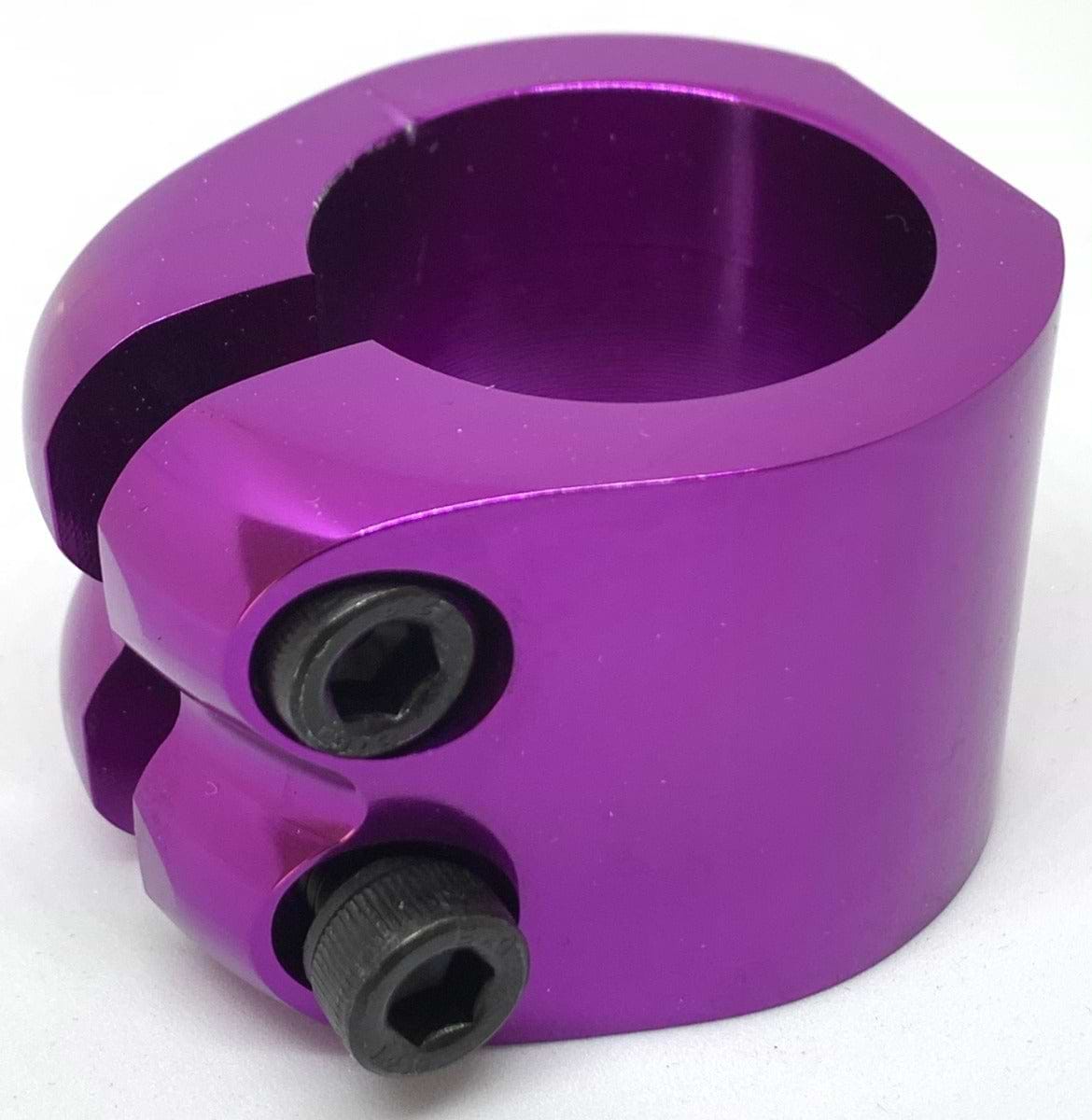 The Dare Warlord 2 Bolt Standard Stunt Scooter Clamp in purple, crafted with CNC machining, features two black bolts and a lightweight design to perfectly fit around a cylindrical object, making it an ideal upgrade for your stunt scooter setup.