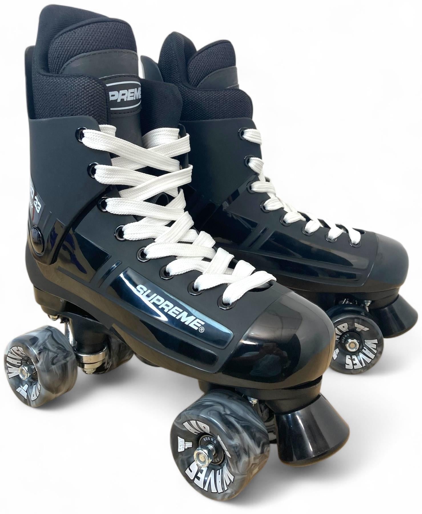 A pair of Supreme Turbo 33 Nylon Quad Roller Skates in black with black swirl wheels and white laces, shown on a white background.