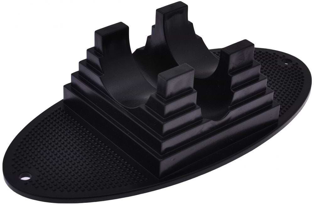 The Dial 911 Stunt Scooter Stand in black is an oval-shaped rubber pad with central pyramid structures, designed to hold items securely. It is ideal as a scooter stand, featuring a textured base and two holes on either end to ensure an upright position.