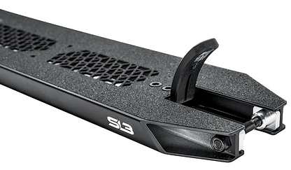 Close-up of the CORE SL3 Forged Black Stunt Scooter Deck, 5.25" wide with a textured grip, cutout patterns, integrated rear brake, and "SL3" logo visible on the side—built tough for park tricks.