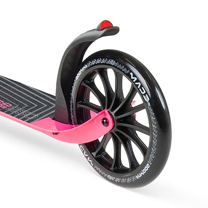 Close-up of the rear wheel on the Madd Gear Metro Cruise 250 Foldable Commuter Scooter in Black/Pink, showing its large black wheel with white rim lettering and a rear fender with red reflector. Brand: Madd Gear (MGP).