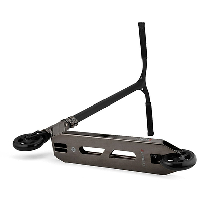 The Drone Element 2 Feather-Light Complete Stunt Scooter in Smoked Chrome features a sleek metallic deck adorned with cut-out designs and is equipped with a Y-shaped handlebar. Its IHC aluminum fork supports Luxe 3 Dual-Core Wheels, making it the ultimate choice for smooth and stylish rides.