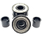 Close-up of a selection from the Entity Ceramic Scooter Bearings - 4 Pack. Two of these high-end bearings are ceramic and encased in sleek black cylindrical spacers, while three others are stacked, revealing their metallic inner rings and dark outer casings against a plain white background.