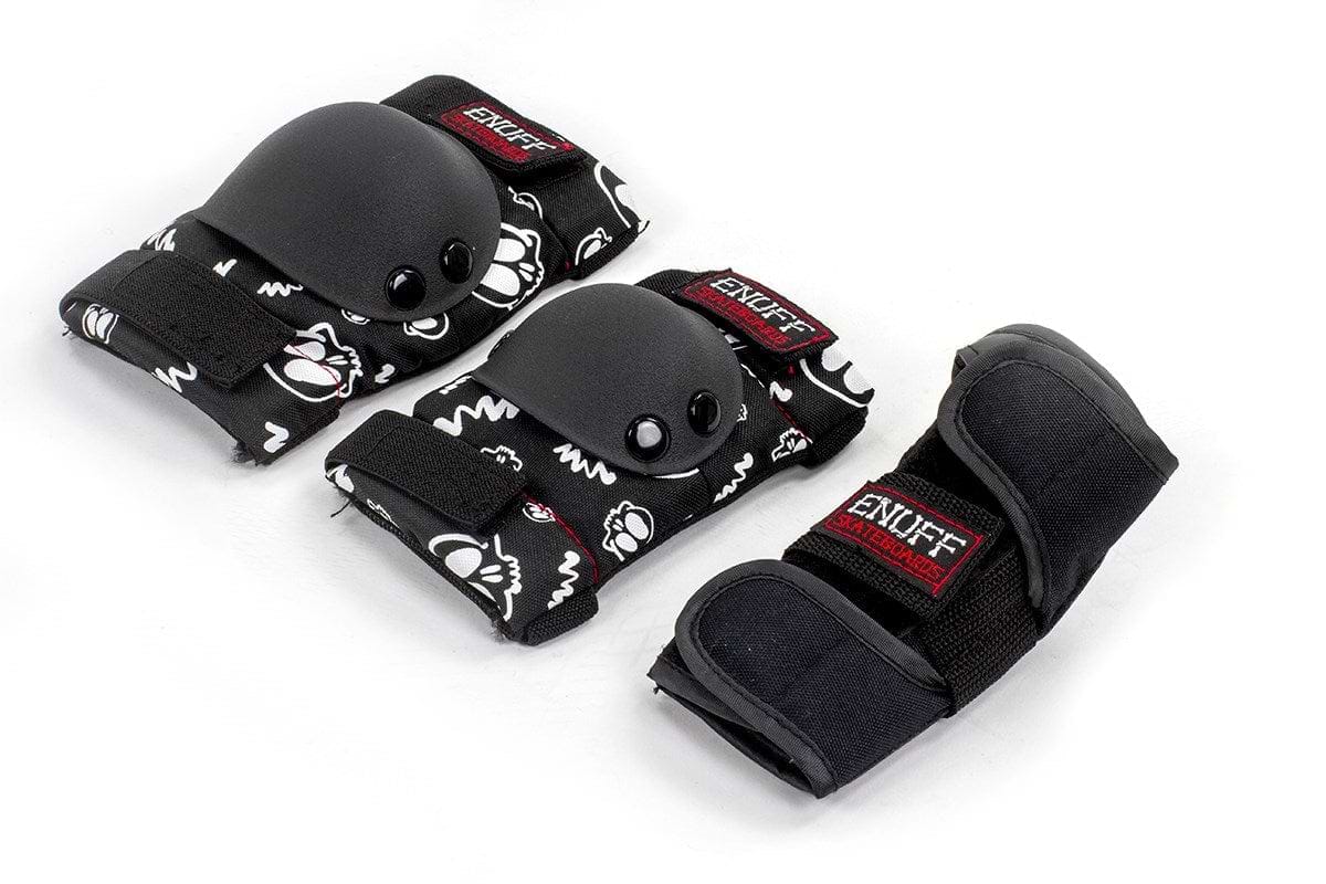 The Enuff Skulls Junior Ramp Skate Protection Pad Set in black provides a fashionable combination of protective gear, including knee pads, elbow pads, and wrist guards decorated with a distinctive black and white design. Enhanced with comfort padding for additional ease and featuring a red "ENUFF" label, this set offers secure yet stylish protection.