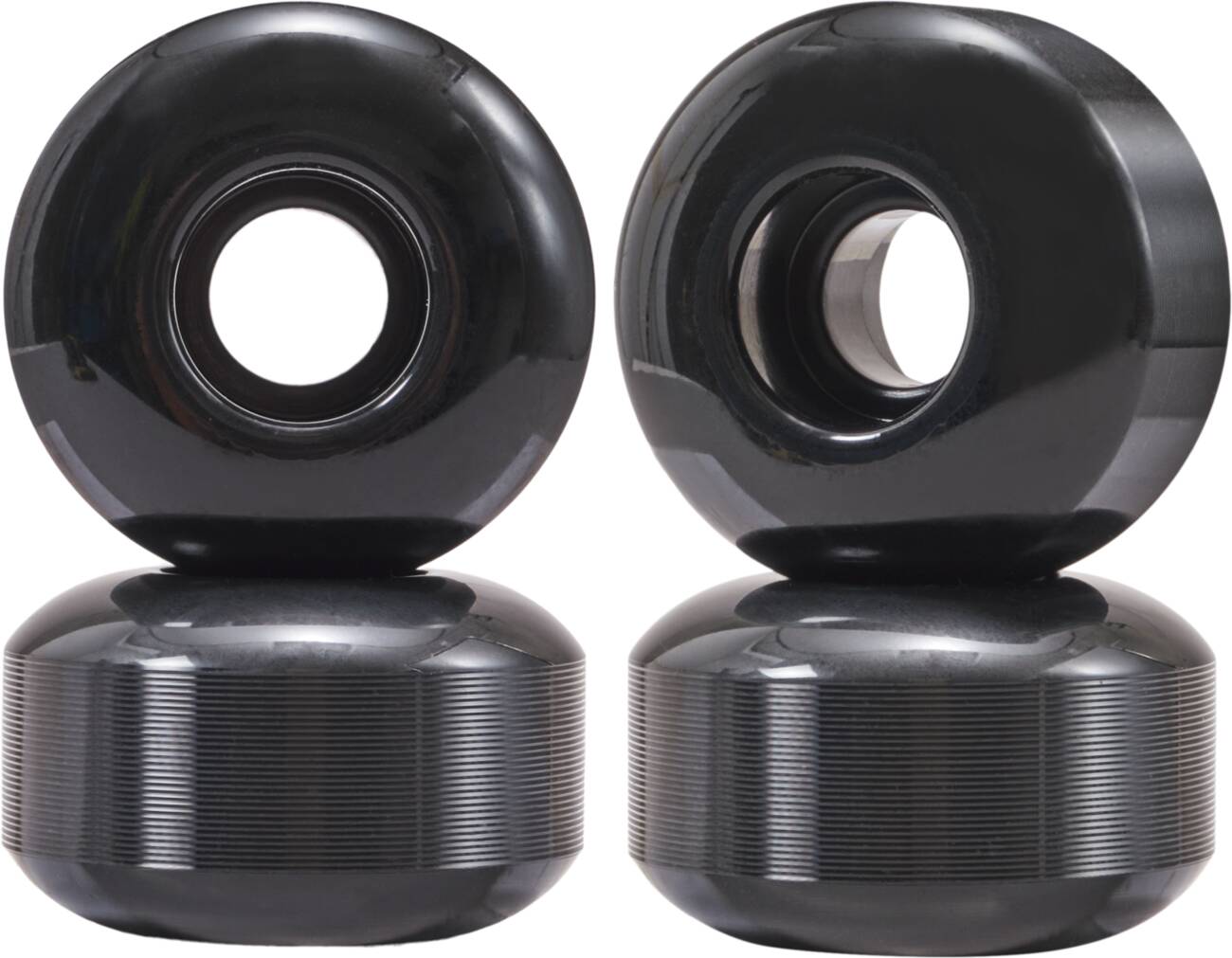 The Essentials 53mm 95A Skateboard Wheels in black, featuring a glossy finish and aligned pairs, offer exceptional handling. The visible holes in the center make attachment easy, ensuring a smooth ride every time.
