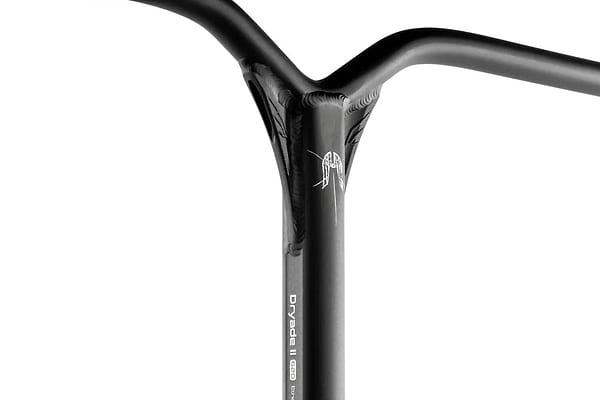 Close-up view of the Y-shaped connection on a black BMX bike handlebar, featuring the text "DRYADE II 600" and a small design above it. The sleek, smooth finish resembles that of Ethic's high-end Dryade V2 Aluminium ICS/IHC Stunt Scooter Bars, recognized for their lightweight aluminum construction and robust durability.