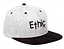 The Ethic DTC Snapback Cap - Deerstalker Grey showcases a timeless snapback style, featuring a gray crown paired with a black brim. The front prominently displays the word "Ethic" embroidered in black, while the smaller letters "DTC" are artistically positioned below, emphasizing its distinctive embroidered Ethic logo.