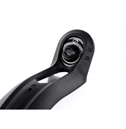 A close-up of a black Ethic DTC component, likely the 12 STD Nylon V3 Stunt Scooter Brake, displays markings "115" and "125" beside a screw. The sleek design stands out against a white background, highlighting its smooth, curved lines.