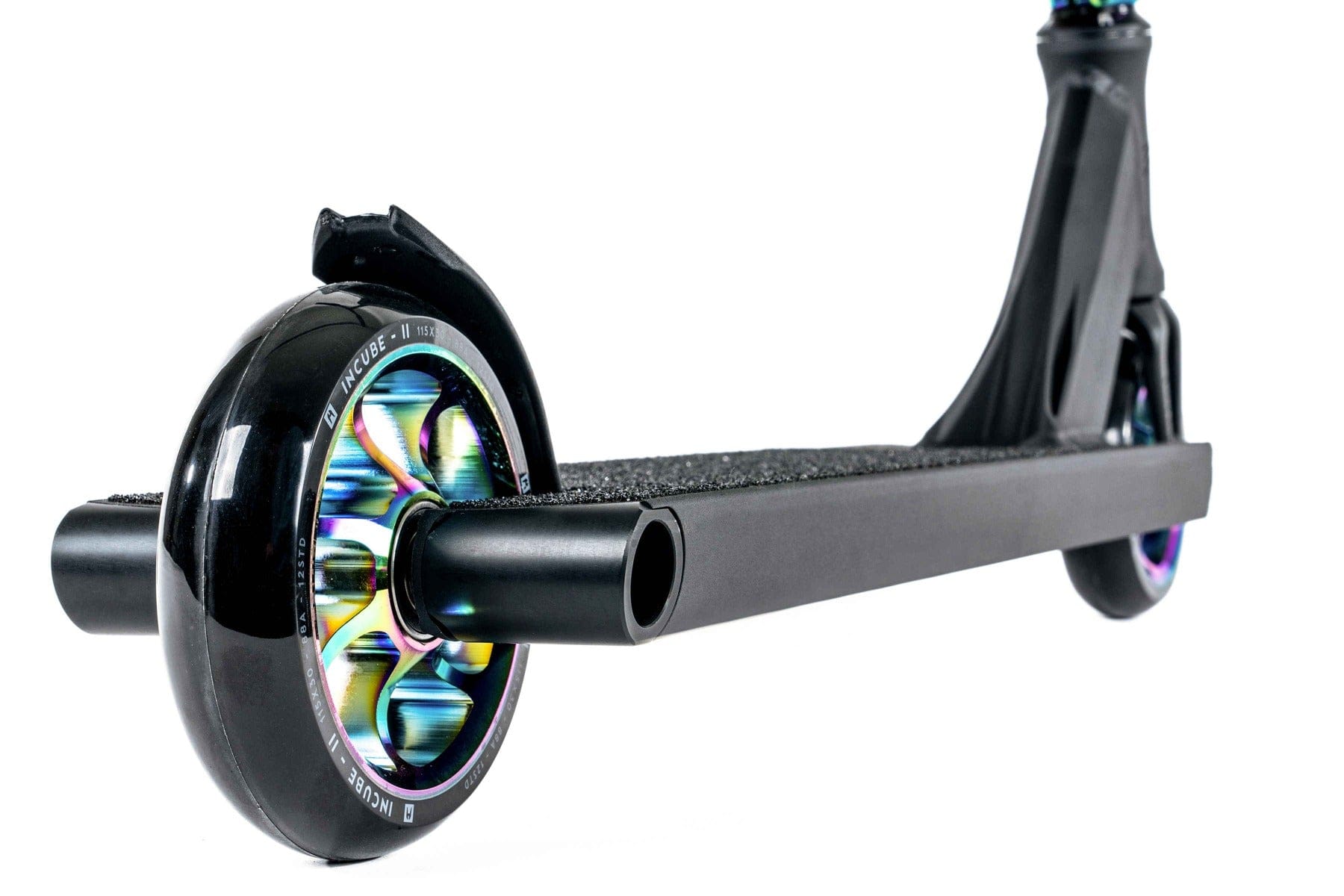 Close-up of the Ethic DTC Pandora Complete Stunt Scooter (L) - Neochrome. This scooter boasts a sleek black design with vibrant neochrome wheel hubs, a textured footboard, and a durable Chromoly steel T-bar. The rear wheel and part of the frame are displayed against a white background, making it ideal for street riding enthusiasts.
