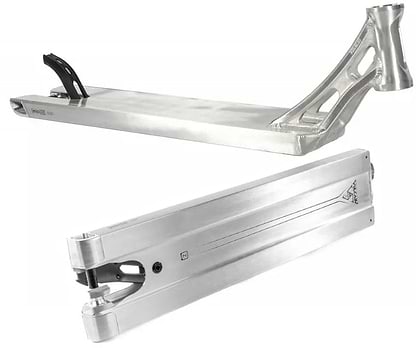 Two silver scooter decks by Ethic are displayed, one from the side and the other from the bottom. The Ethic DTC Vulcain V2, with its boxed 12 STD design, showcases angular features and cutouts near the neck in the side view, while smooth lines and wheel mounts are prominent in the bottom view, highlighting its suitability for any stunt scooter setup.