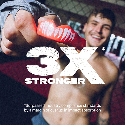 A smiling, shirtless man at the gym holds out a red Safejawz Extro Series Protection Mouthguard - Viper with white teeth designs. Bold text reads “3X STRONGER” and notes the high impact absorption of this Safejawz mouthguard.