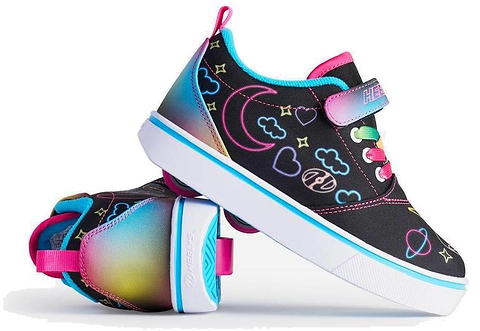 Two Heelys Pro 20 Prints X2 Girls Shoes by Heelys in Black/Hot Pink/Multi, featuring neon heart, star, and planet designs. One shoe is upright; the other shows a pink, teal, and yellow gradient heel and white soles.