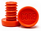 The image displays two vibrant red objects made of aluminum. One has a ridged plug design, while the other is a flat disc with "CORE Aluminium Scooter Bar Ends" embossed on it. They are set against a white background, emphasizing their bold color and sleek design by CORE.