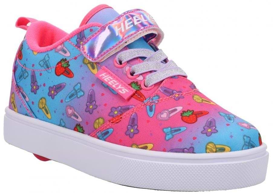 The Heelys Pro 20 X2 Girls Shoes in Pink/Cyan feature a vibrant nylon upper with cartoon flowers, strawberries, butterflies, silver glitter laces, a pink "Heelys" strap, white sole with wheel in the heel, and smooth ABEC 5 bearings.