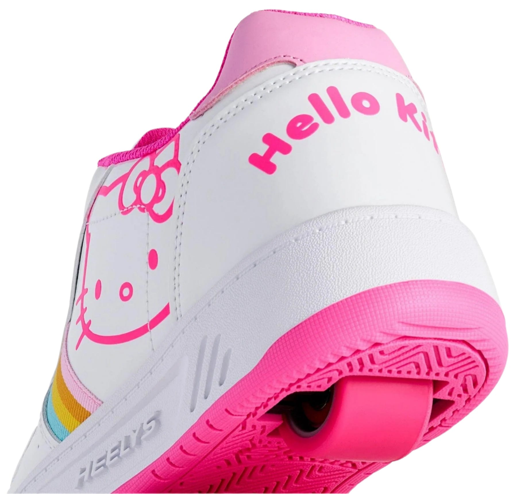 Close-up of Heelys x Hello Kitty Kama Girls Shoes by Heelys in white/pink, featuring Hello Kitty’s face, rainbow stripes on the side, “Hello Kitty” in pink on the heel, and a bright pink sole with matching accents and wheel.