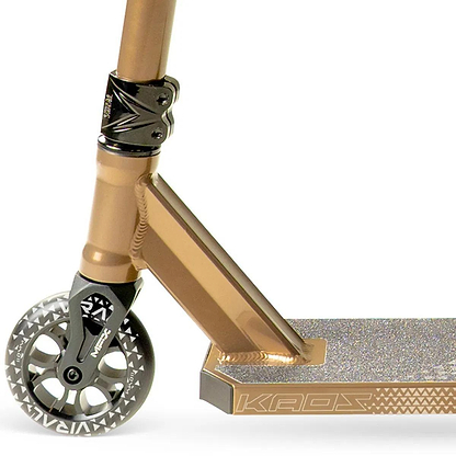 Close-up of the Madd Gear Viral KAOS Complete Stunt Scooter - Ash, highlighting the front wheel, fork, angled deck with a textured grip surface, and handlebar stem. Features bold geometric "KAOS" branding.