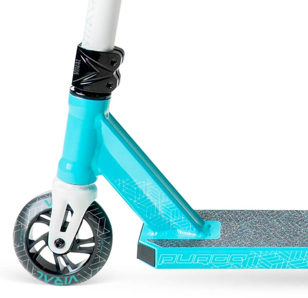 Close-up of the Madd Gear (MGP) Viral Purge Complete Stunt Scooter - Aqua shows the front wheel, fork, and textured deck grip with "PURGE" printed on the side. Designed for kids who love stunt scooters.