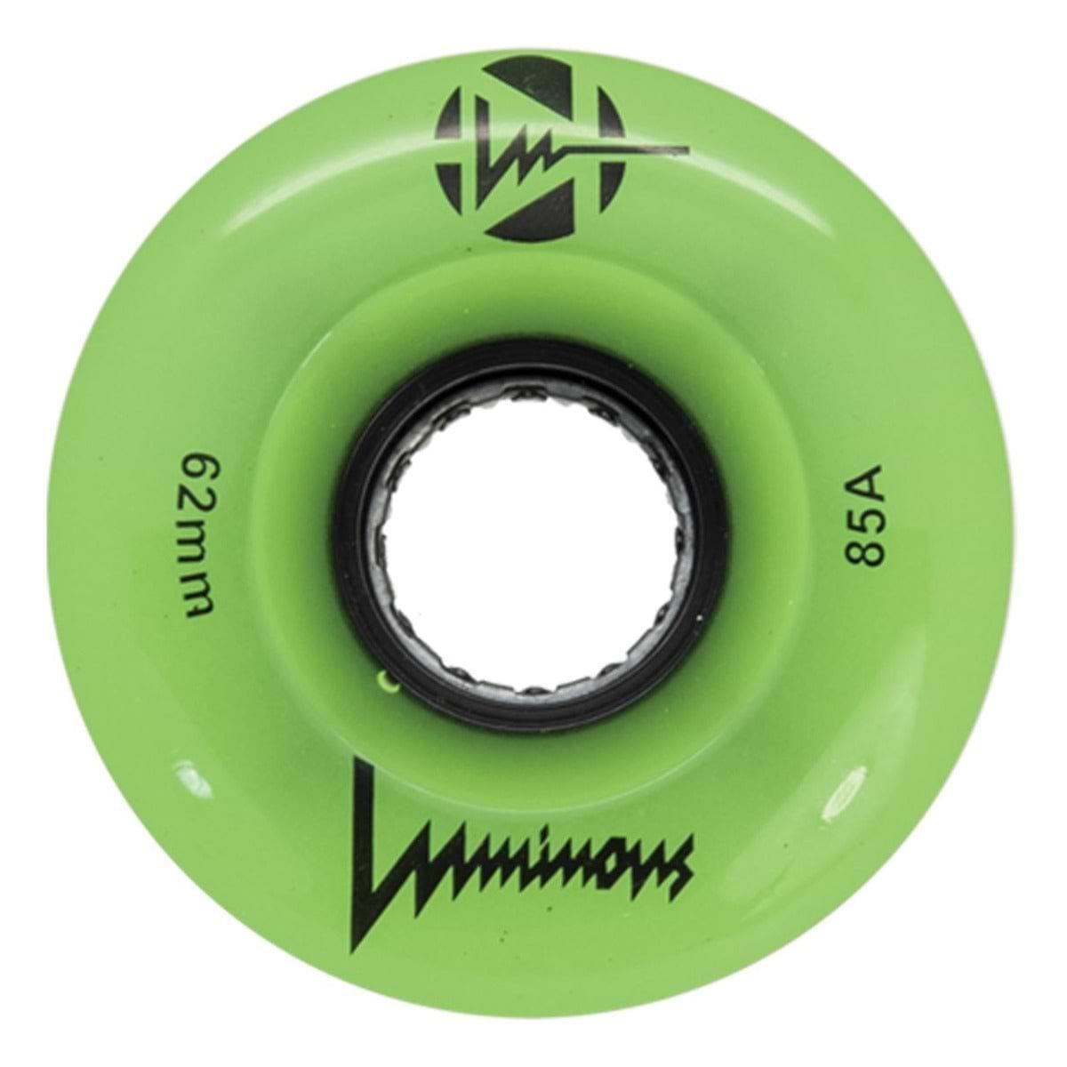 A green "Luminous LED 85A Quad Roller Skate Wheel" (62mm, 85A durometer) displays the brand name "Luminous," a black lightning bolt logo, and a visible bearing hole.