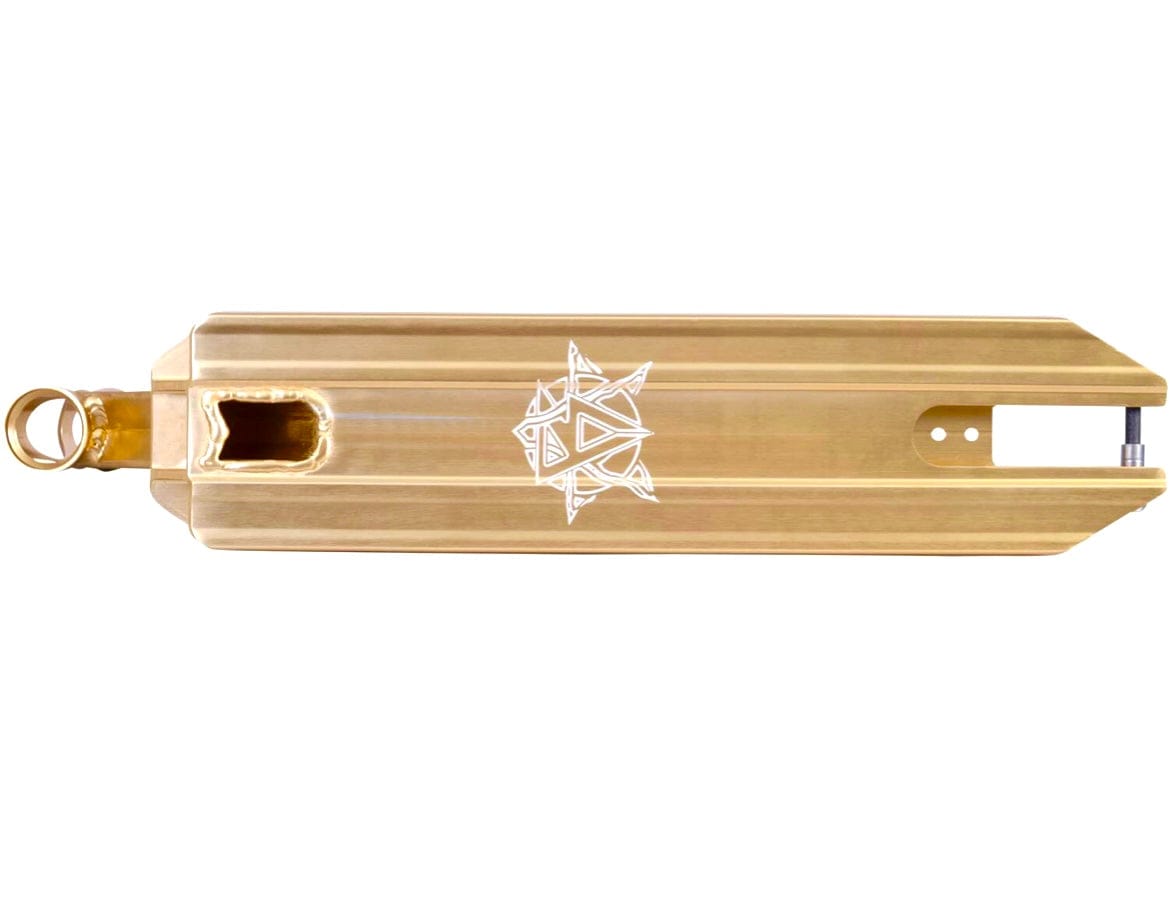 The Revolution Storm Gold Chrome Stunt Scooter Deck by Revolution is perfect for park riders, showcasing a stunning gold finish adorned with a geometric white design. It includes a cutout at one end and a circular attachment point at the other, while its reflective metal surface ensures you ride in style and stay visible.