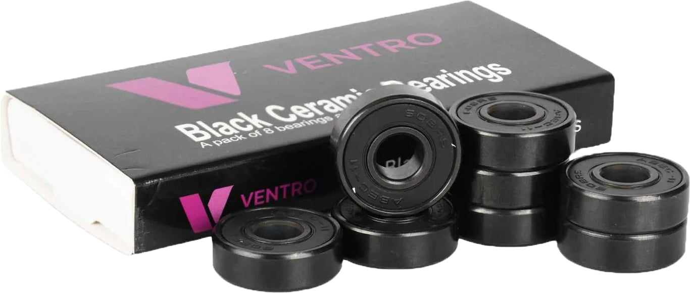 Eight Ventro Ceramic ABEC 11 Black Bearings are neatly arranged in front of a Ventro-branded box labeled "Ceramic ABEC 11 Black Bearings." This set of precision 608 size bearings is engineered to deliver a smooth and durable ride, making them an excellent choice for skateboard enthusiasts.